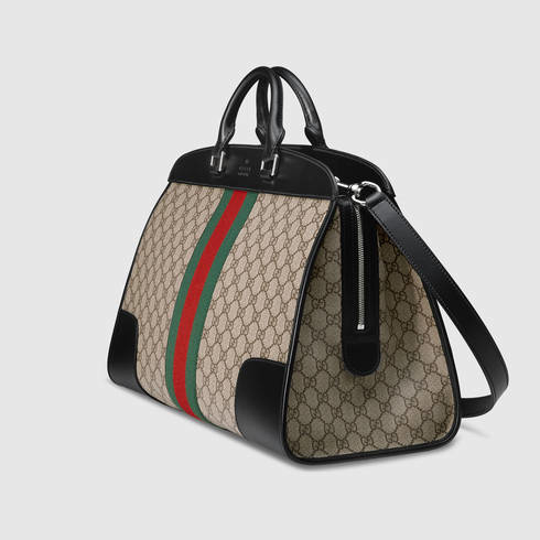 gucci supreme duffle bag