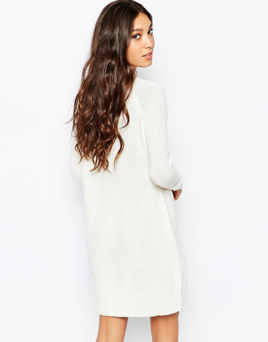 white knitted jumper dress
