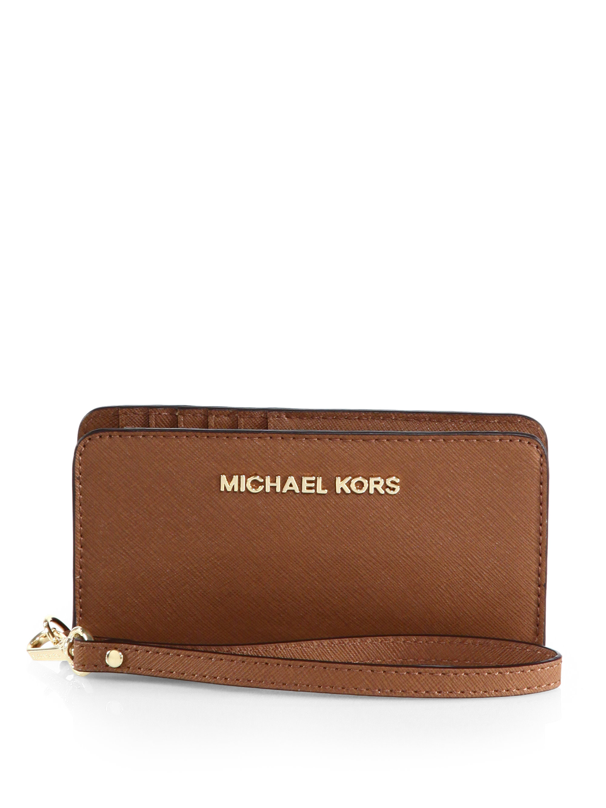 Michael Michael Kors Slim Tech Wristlet in Brown (LUGGAGE) Michael Michael Kors Slim Tech Wristlet in Brown (LUGGAGE)