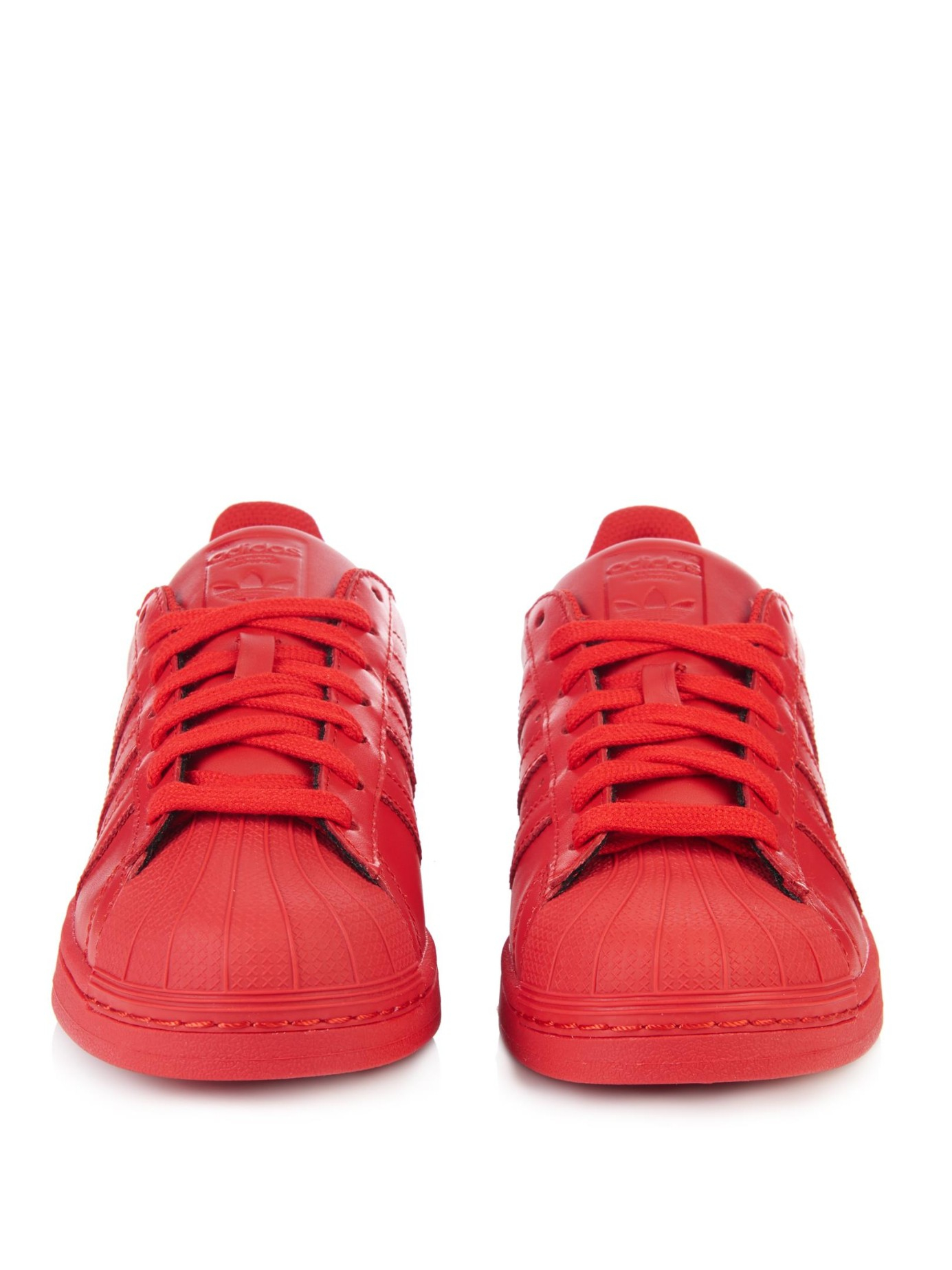red leather adidas shoes