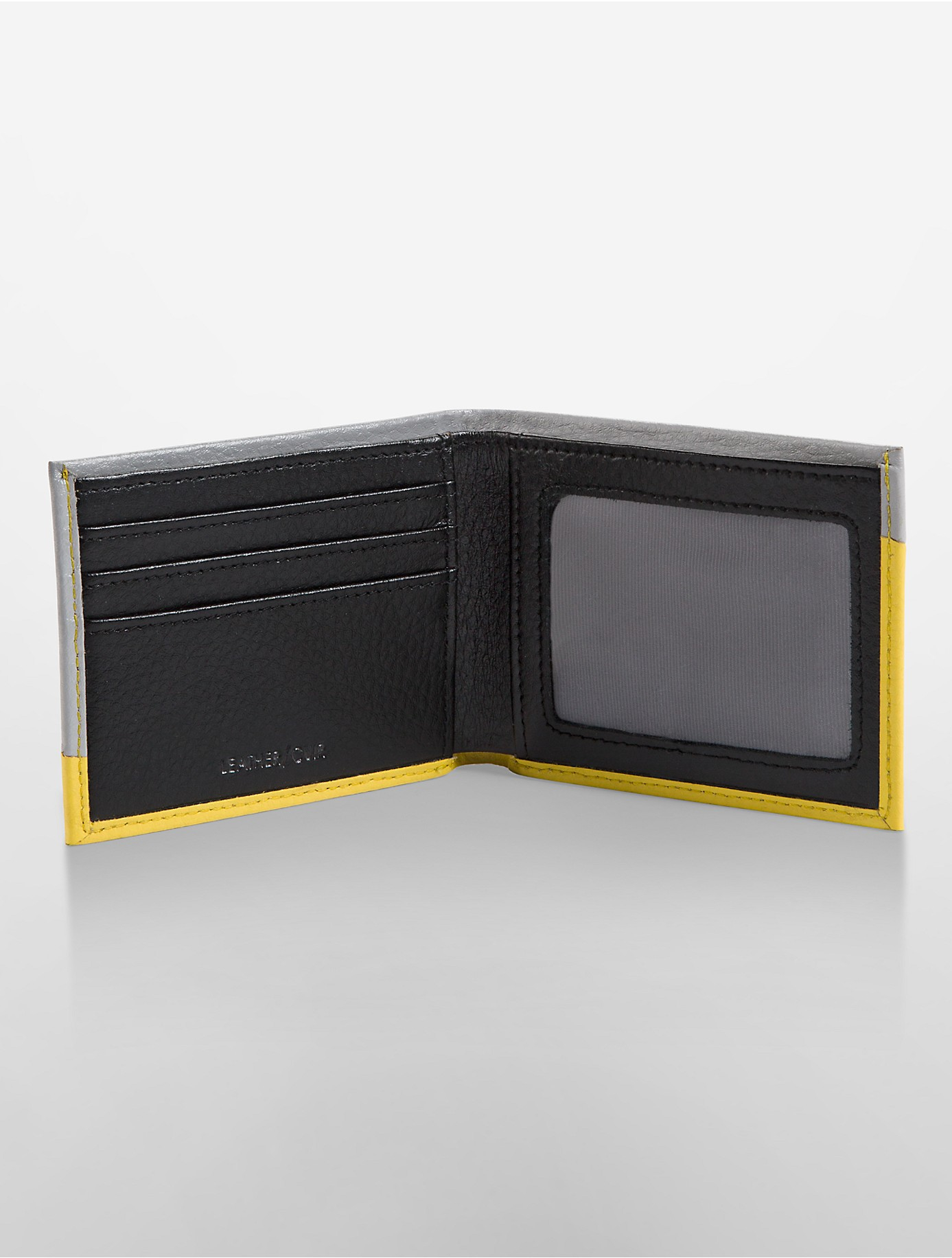 Lyst - Calvin Klein Soho Textured Leather Slimfold Wallet in Yellow for Men
