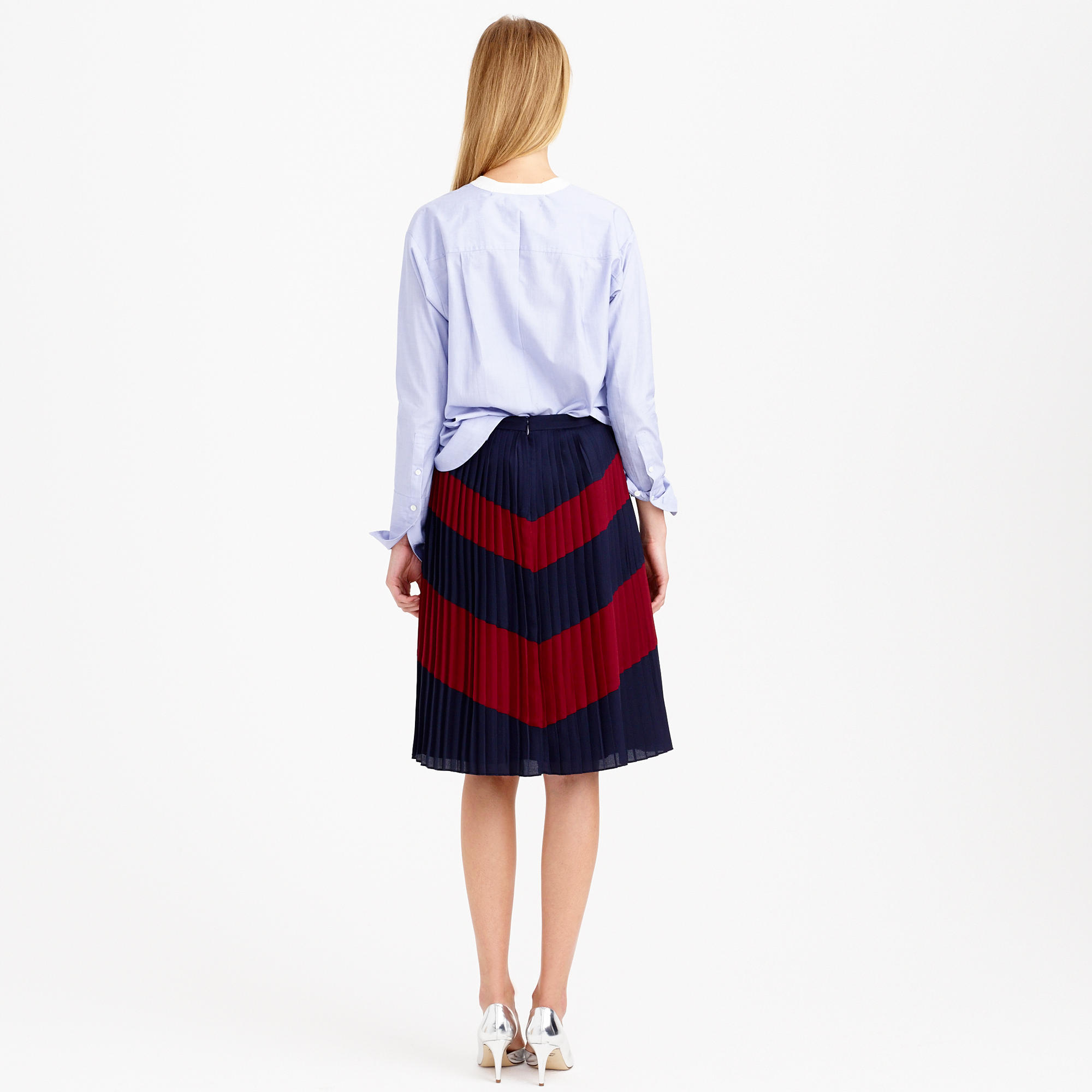 crew neck and pleated skirt