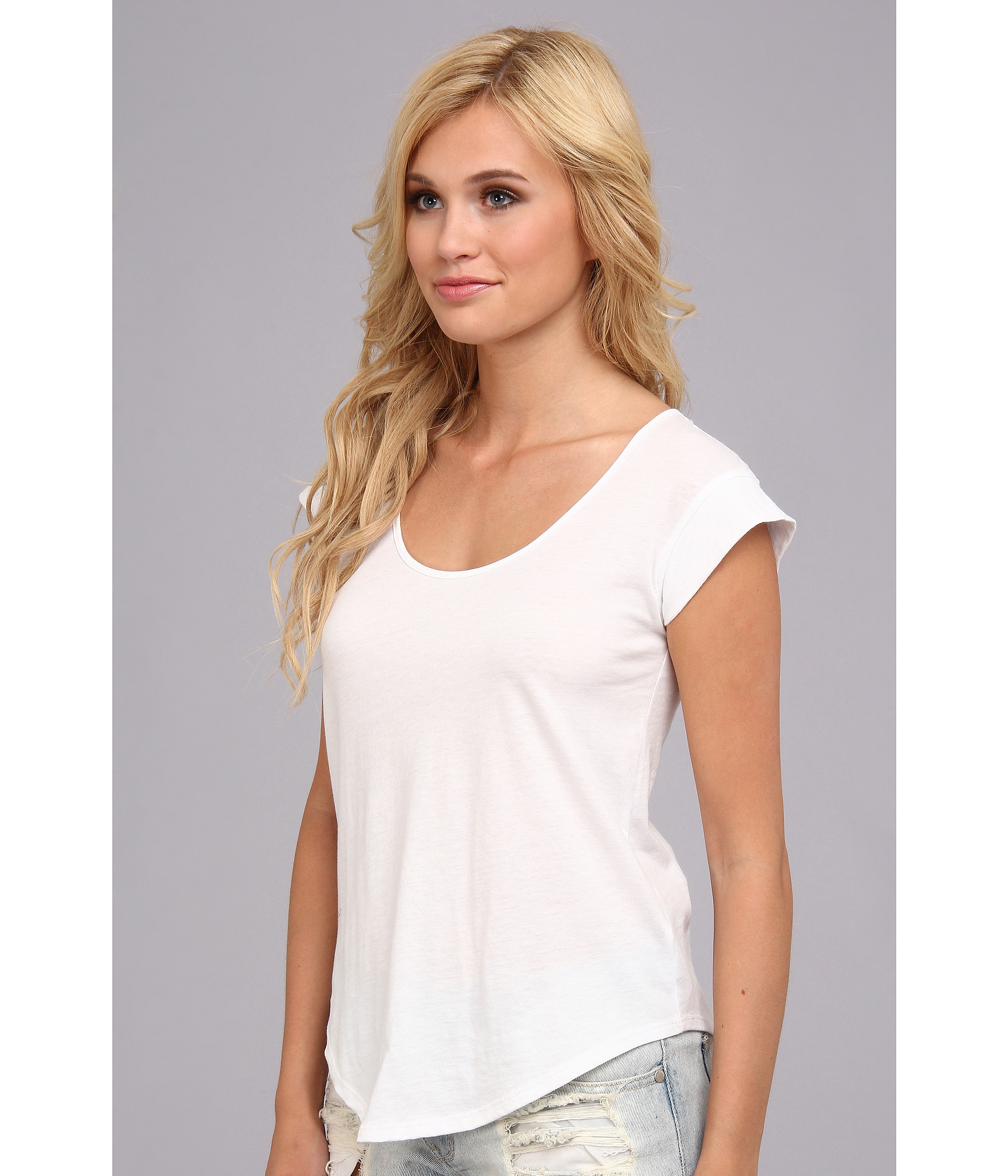white cap sleeve shirt
