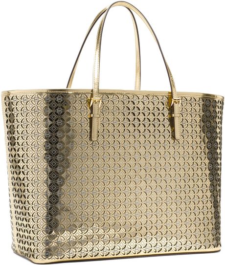 Michael Kors Michael Medium Perforated Flower Travel Tote in Gold | Lyst