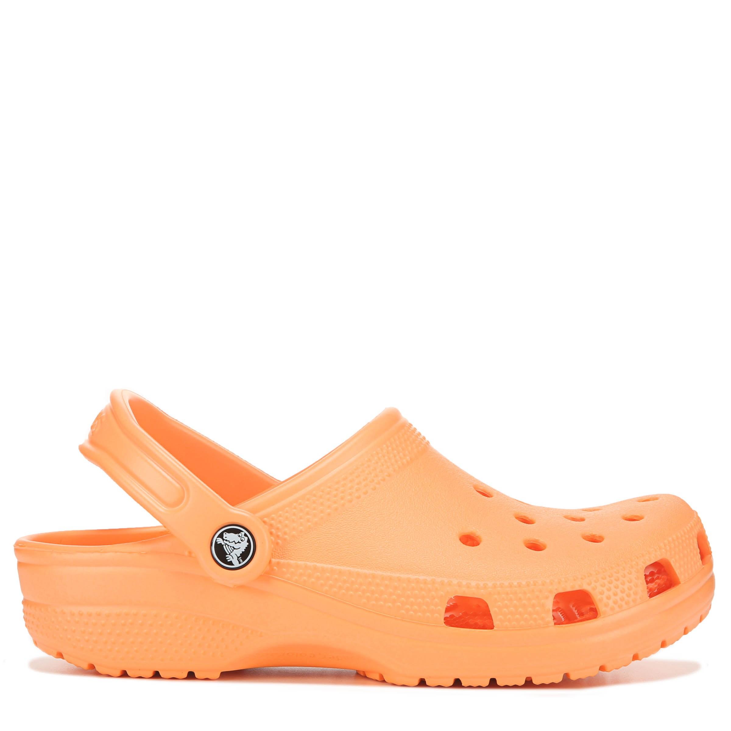Crocs™ Classic Orange Clogs Lyst