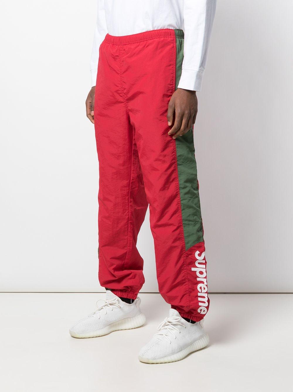 Pantalones de chándal con logo en el lateral Supreme de hombre de color  Rojo | Lyst