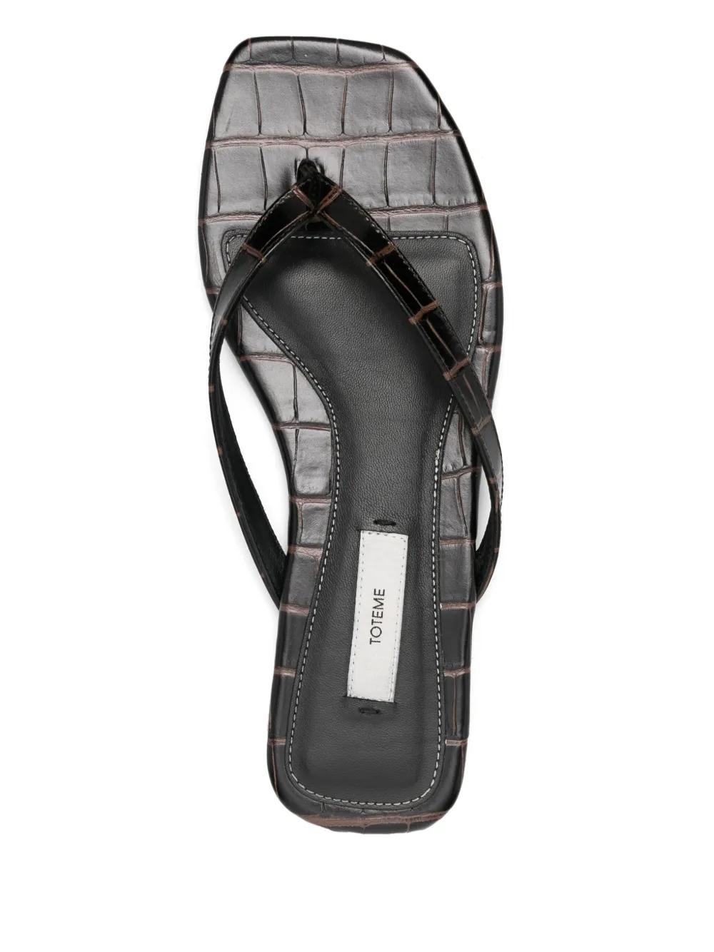 TOTEME Croco-Embossed Flip-Flops in Black | Lyst