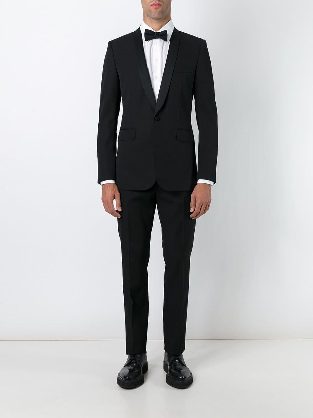 Traje \