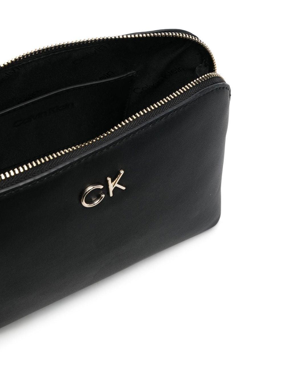 Calvin Klein Synthetisch Toilettas Met Logoplakkaat in het Zwart Dames Tassen voor voor Make-uptasjes en beautycases voor 