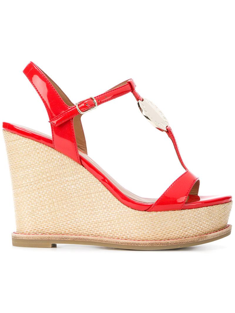 red strappy wedge sandals
