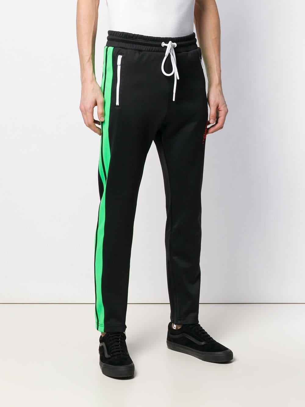 Pantaloni sportivi con banda lateraleDIESEL in Cotone da Uomo colore Nero |  Lyst