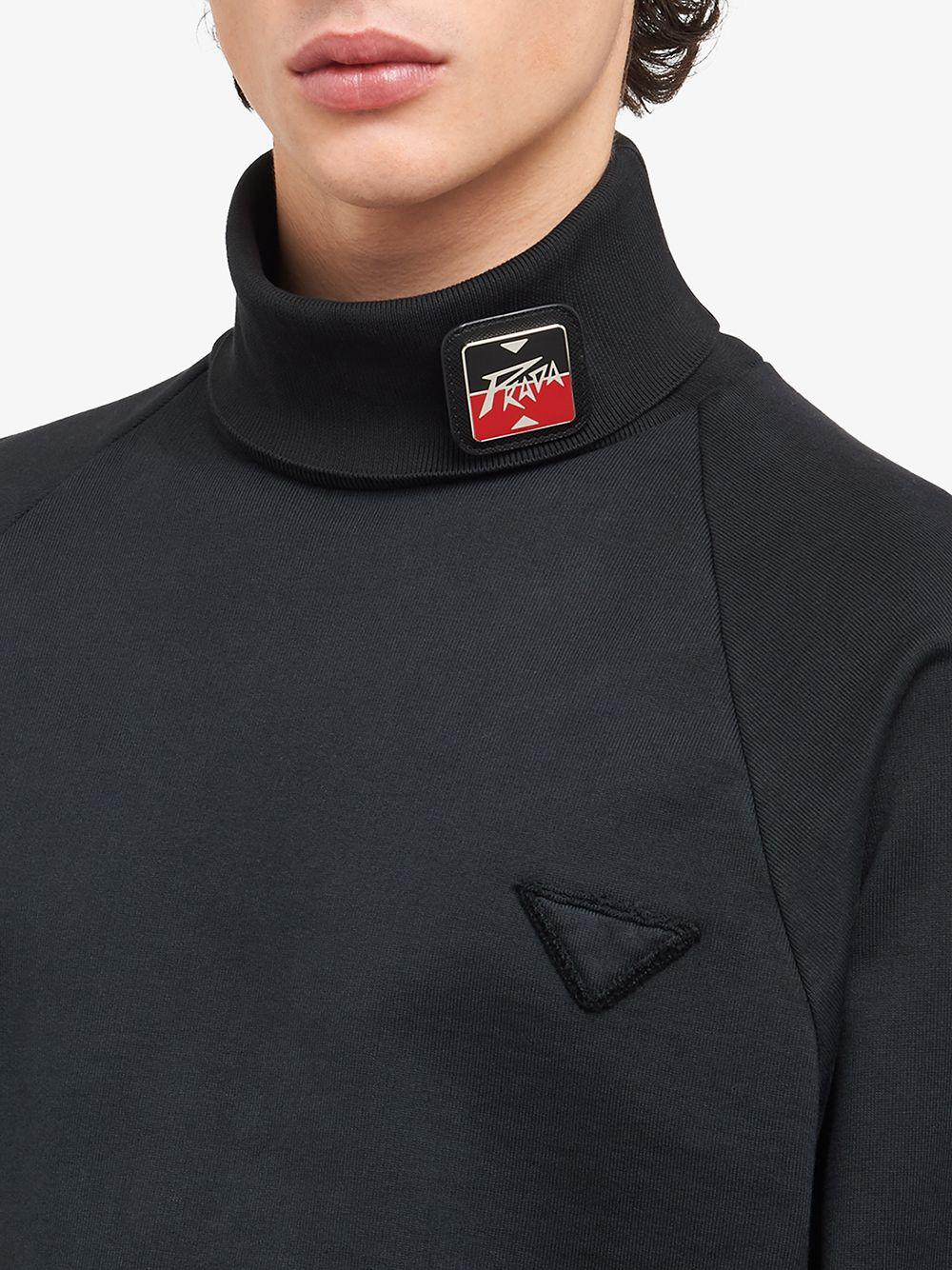 prada logo brooch