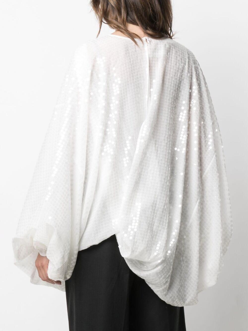 white sequin blouse