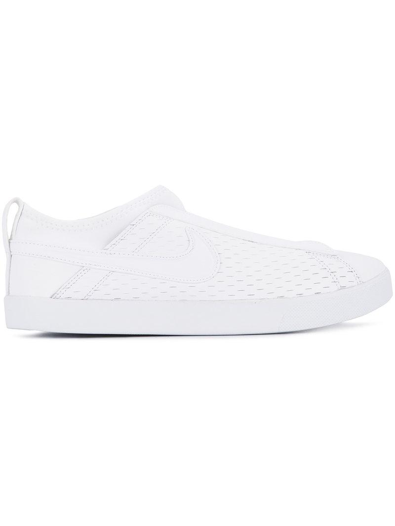nike racquette slip on
