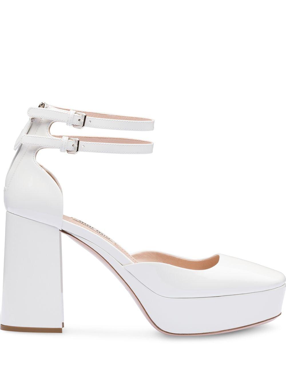 white patent leather platform pumps