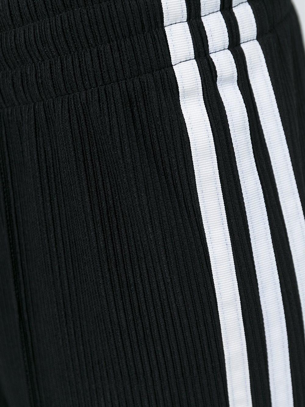 adidas Originals Flared Three Stripe Trousers in Black - Lyst