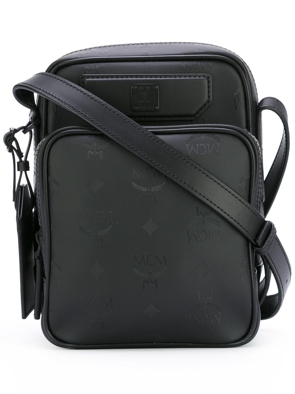MCM Leather Logo Embossed Messenger Bag in Black for Men - Lyst