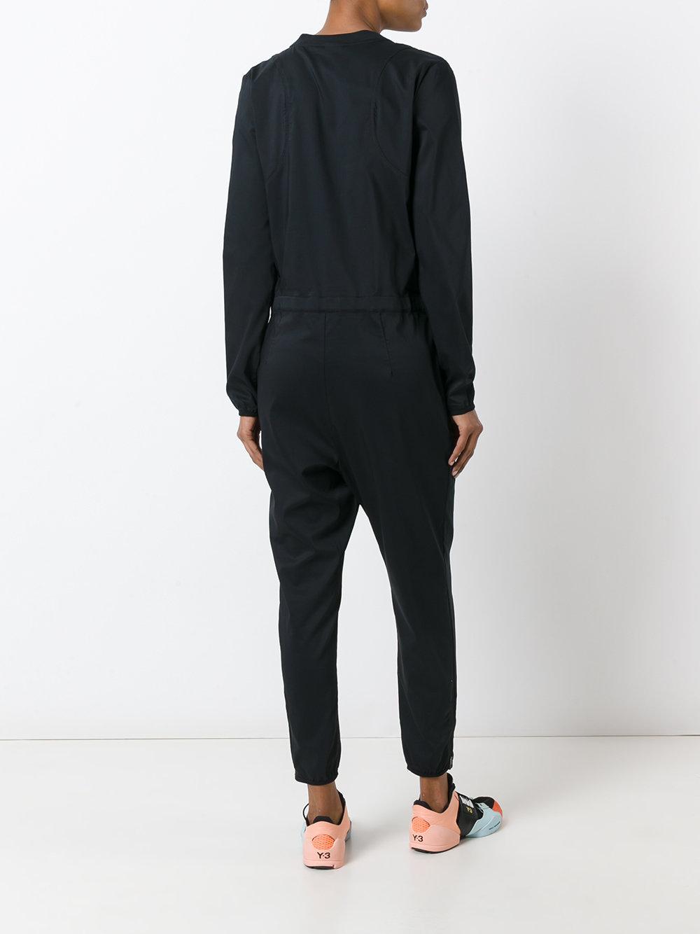 Nike - International Jumpsuit - Women - Cotton/polyester - L in Black - Lyst