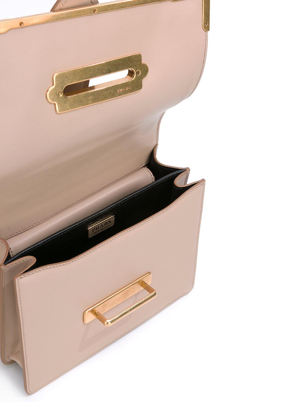 Prada Off White Laser Cut Leather Cahier Flap Shoulder Bag at