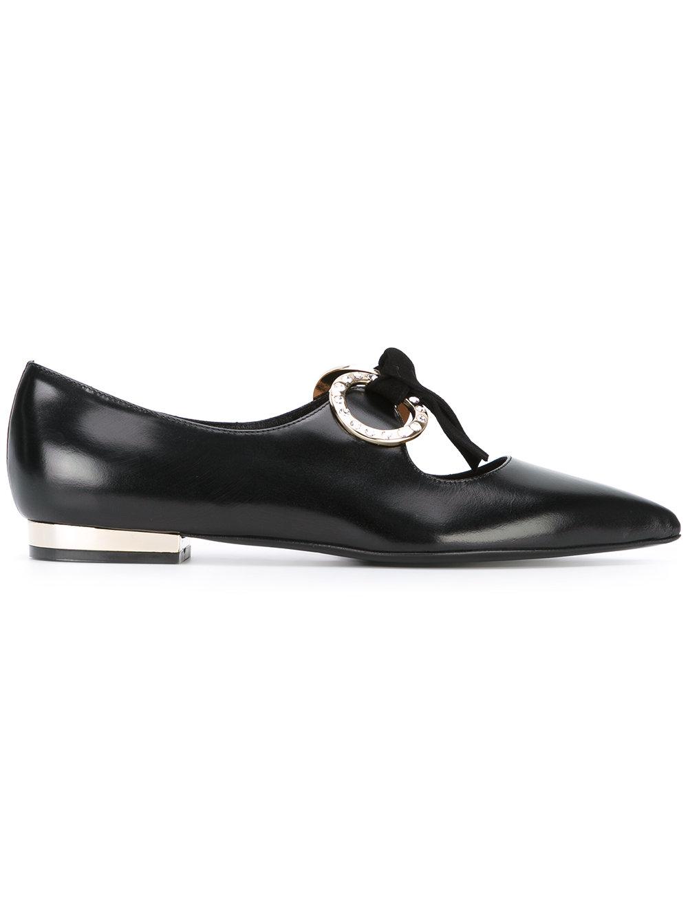 black pointed ballerinas