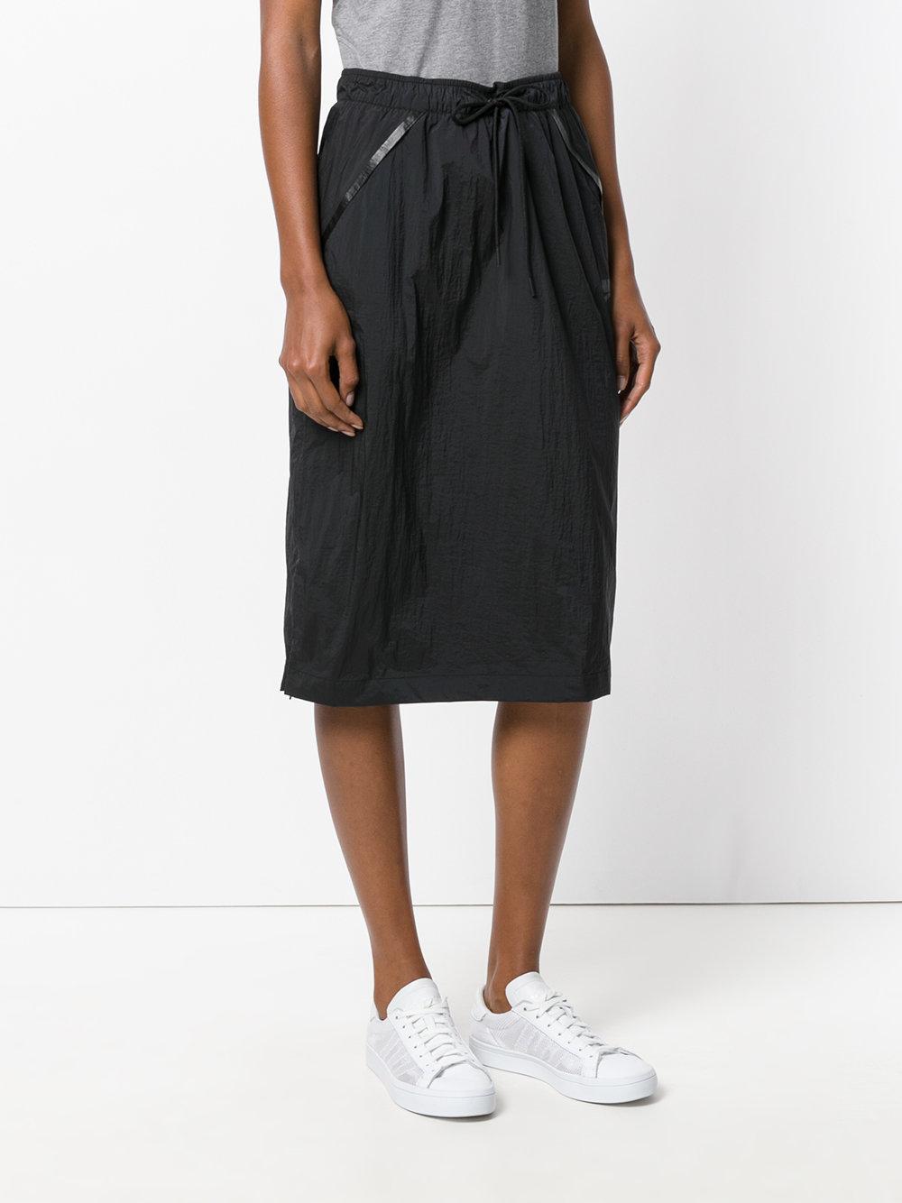 Nike Synthetic Track Midi Skirt in Black - Lyst