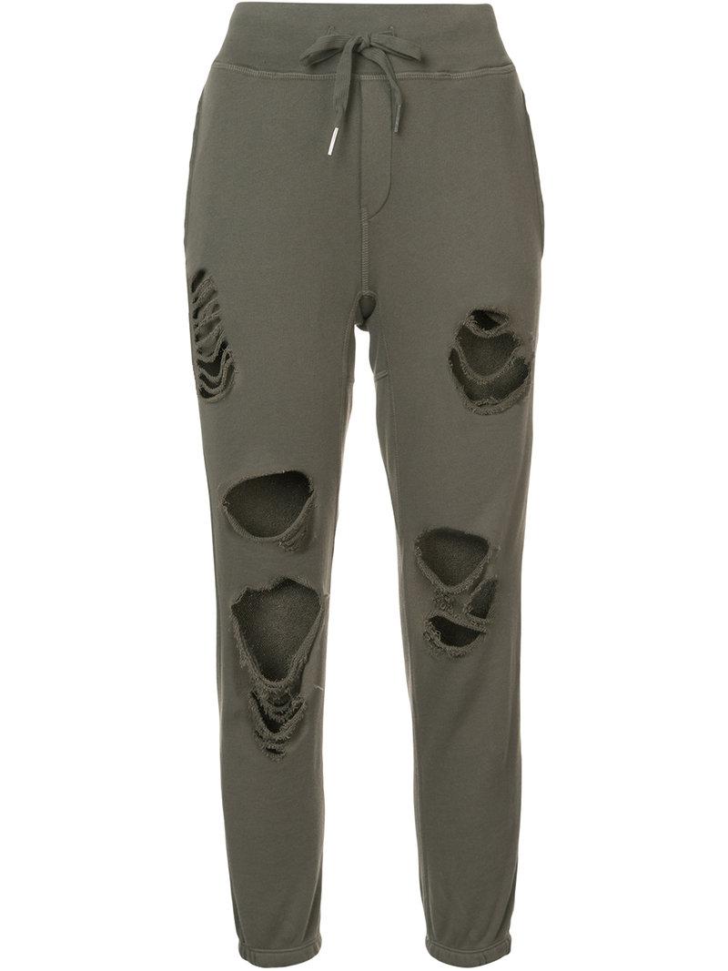 distressed track pants