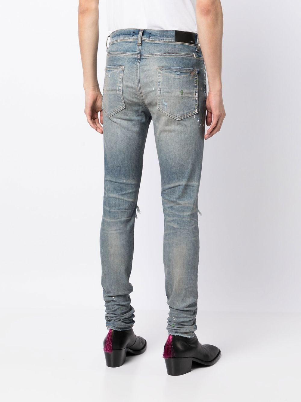 Amiri jeans shop paint
