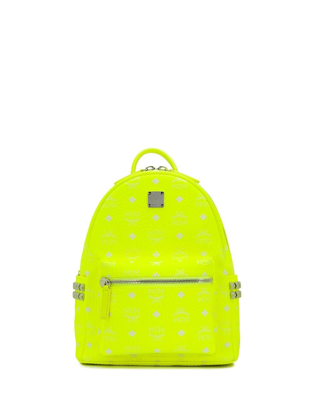 Mochila fluorescente MCM de color Amarillo | Lyst