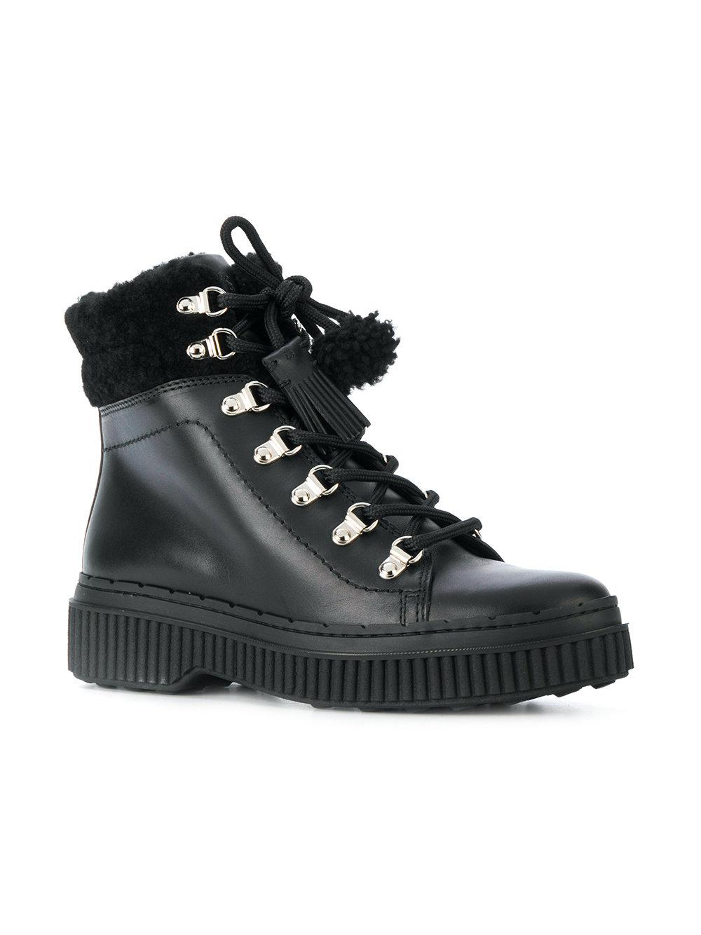 Botas con ribete de lana de oveja Tod's de Cuero de color Negro - Lyst