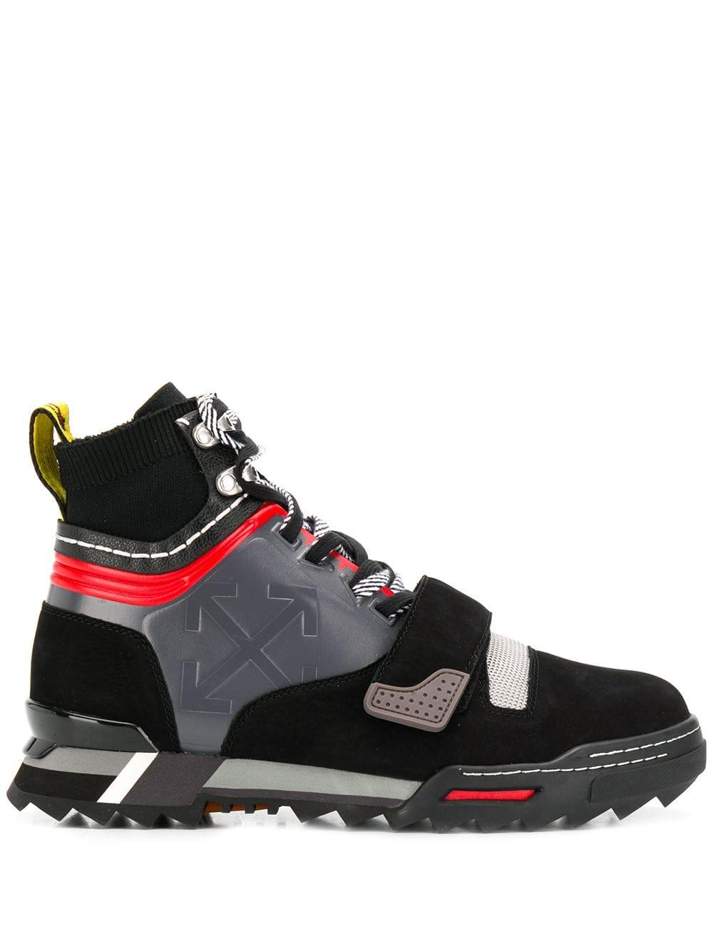 sneakers with arrow logo