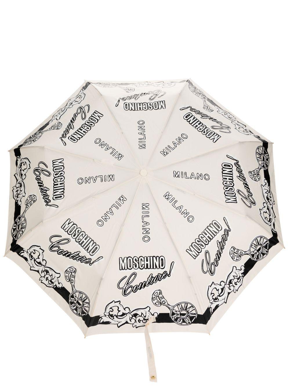 Damen Accessoires Regenschirme Moschino Regenschirm mit Logo-Print in Natur 