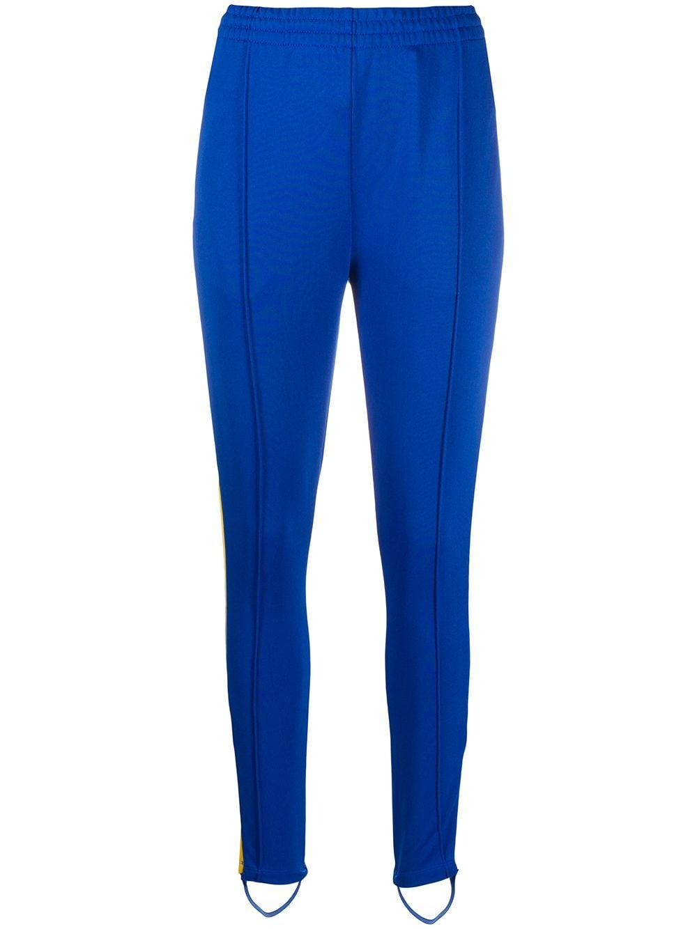 Pantalones de chándal pitillo adidas de Algodón de color Azul | Lyst