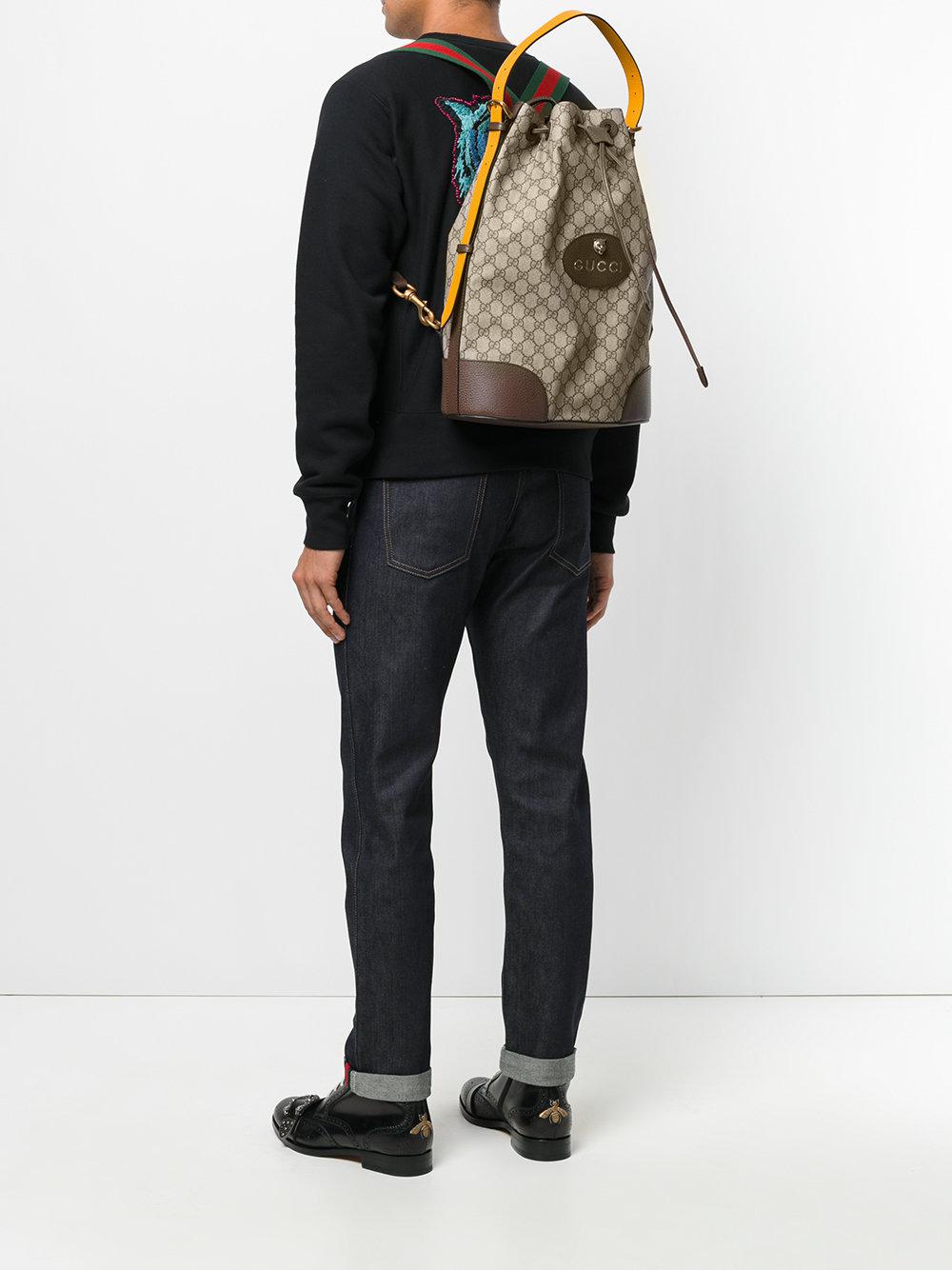 gucci gg supreme sling backpack