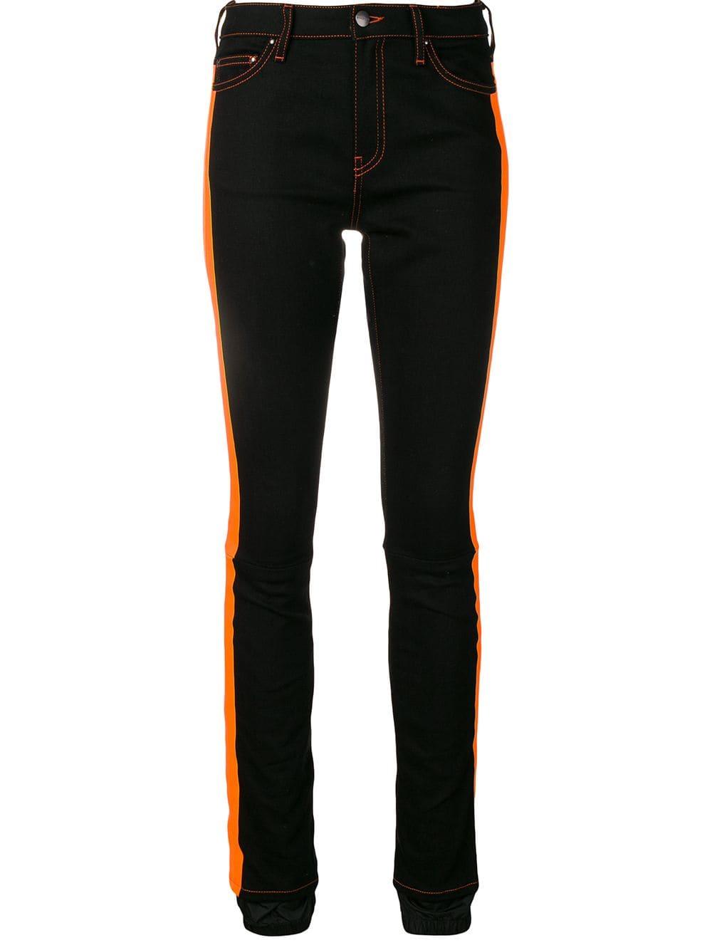 black jeans with orange stripe