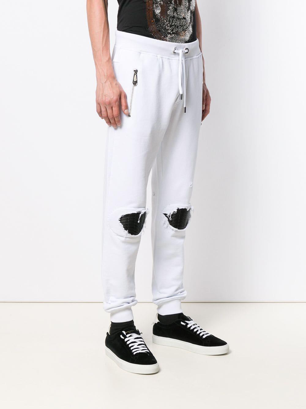 distressed track pants