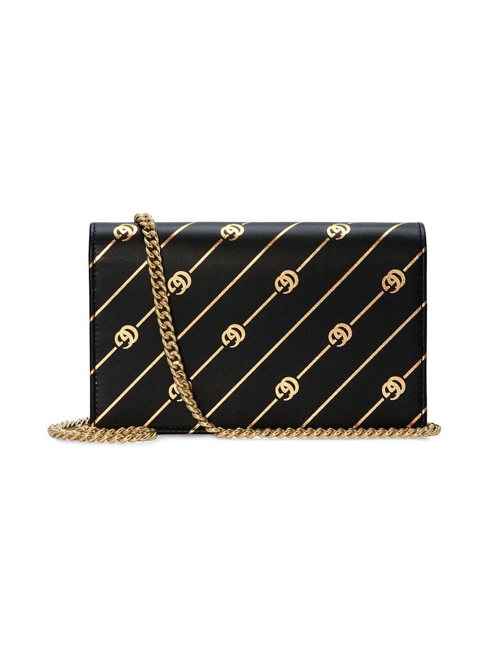 gucci black purse with gold chain