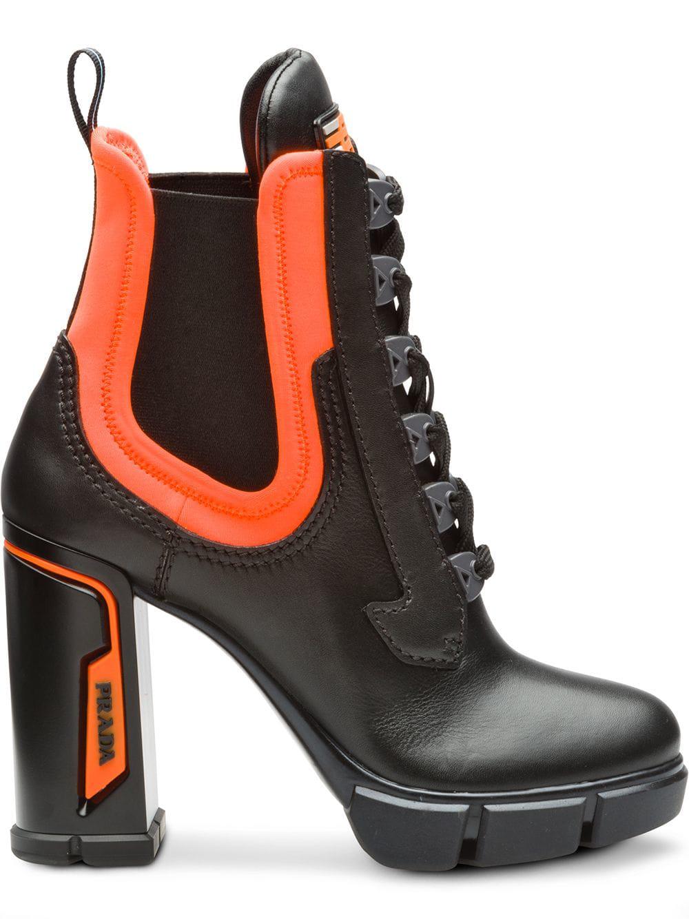 Orange and black prada boots on sale