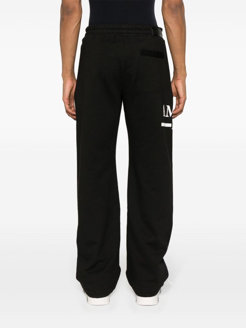 Amiri Logo-print Wide-leg Track Pants in Black for Men