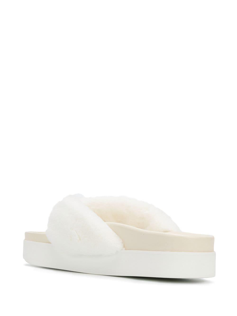 white fur flip flops