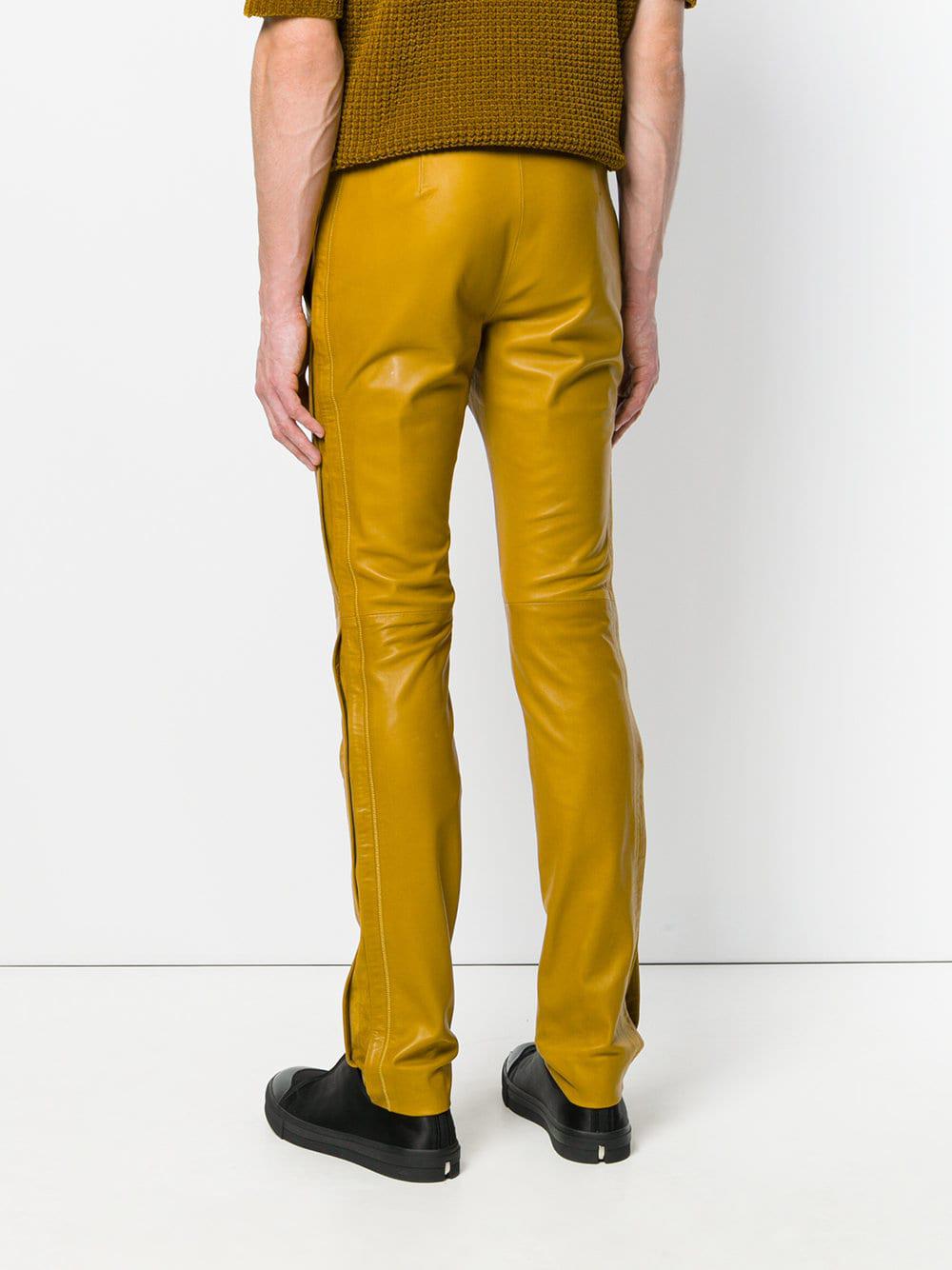 yellow leather pants