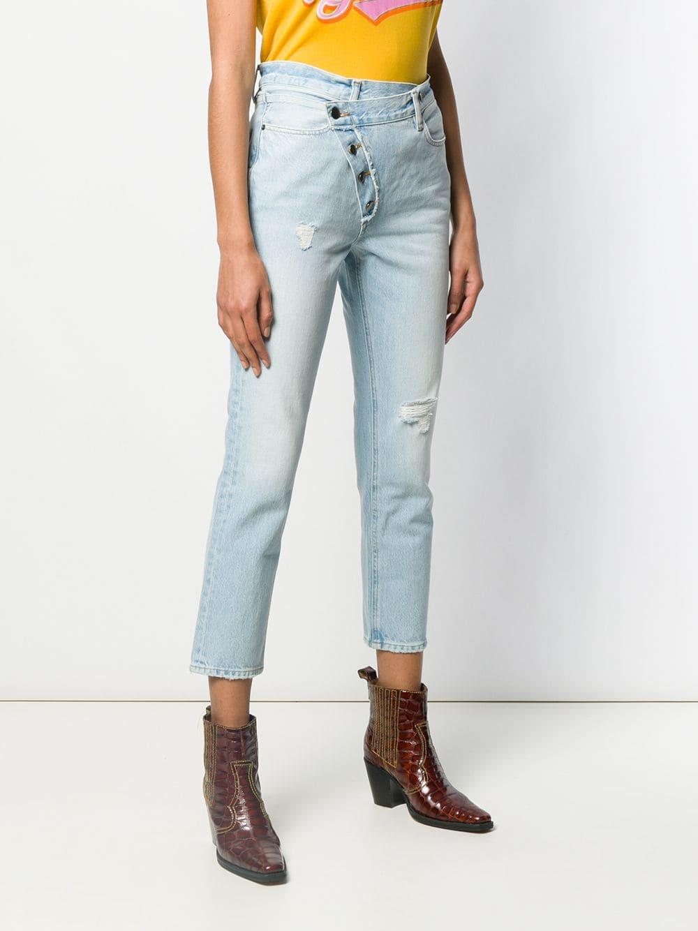 FRAME Denim Exposed Overlap Jeans in 