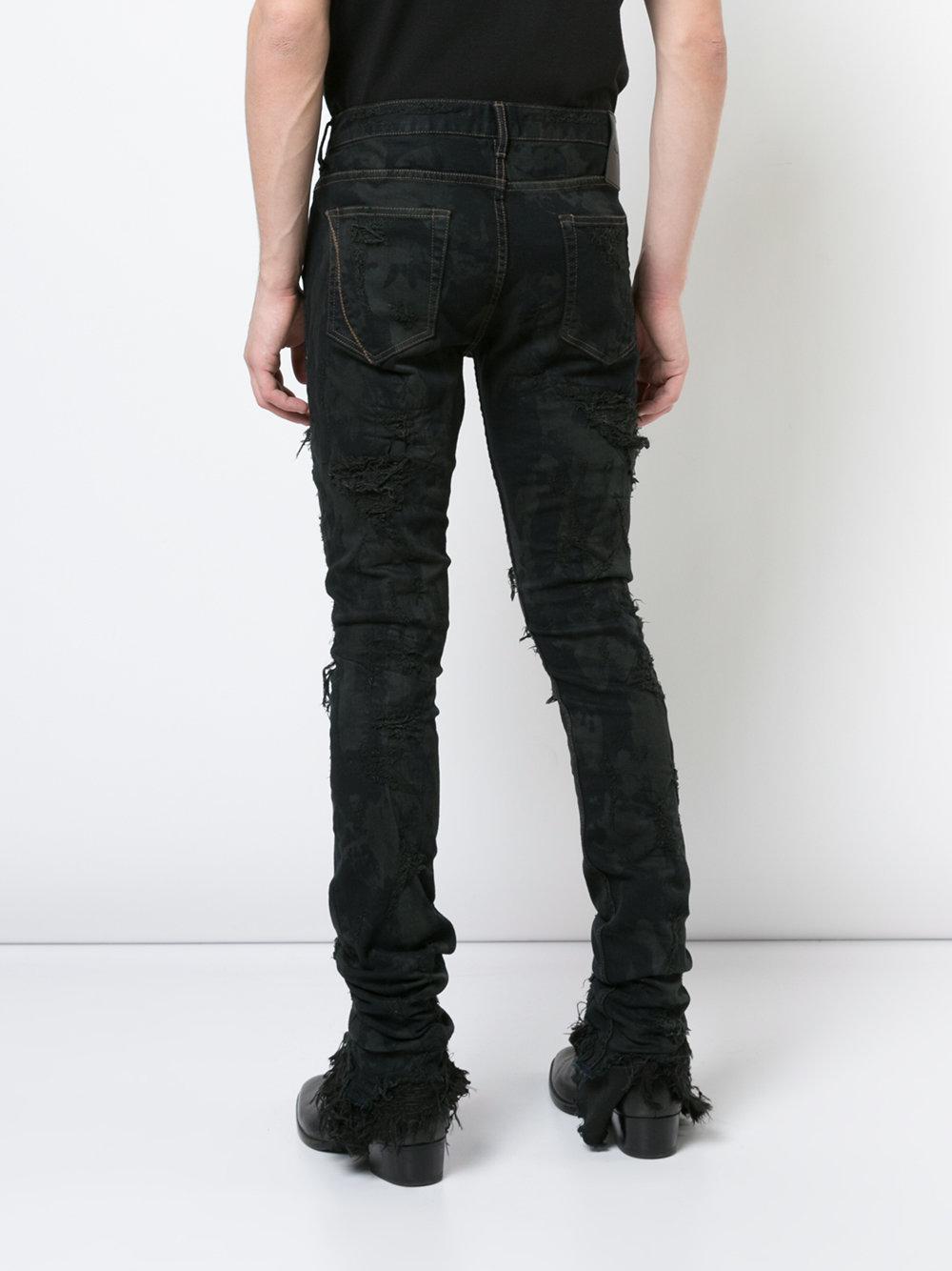 distressed paint splatter jeans