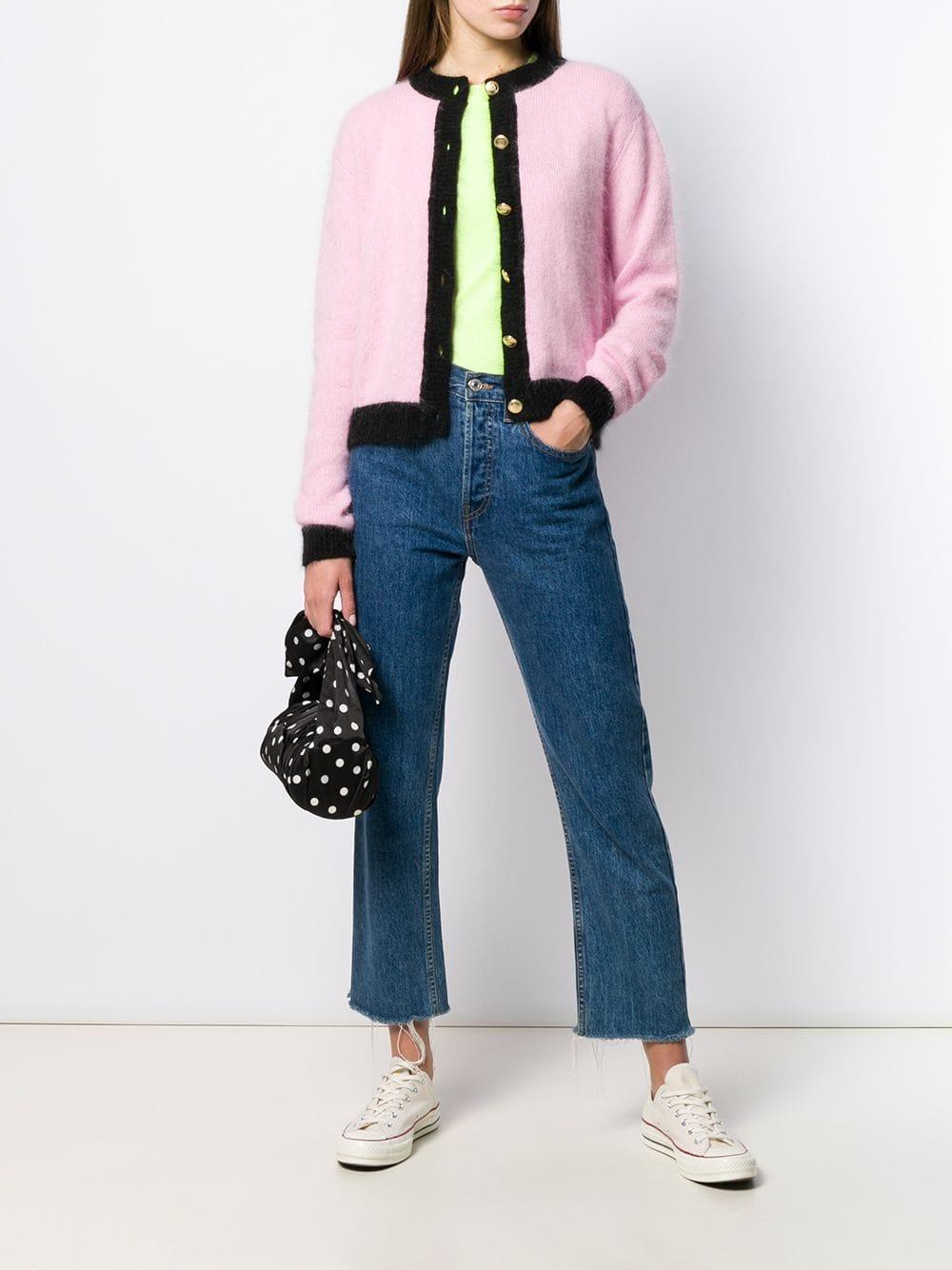 pink cardigan with black trim