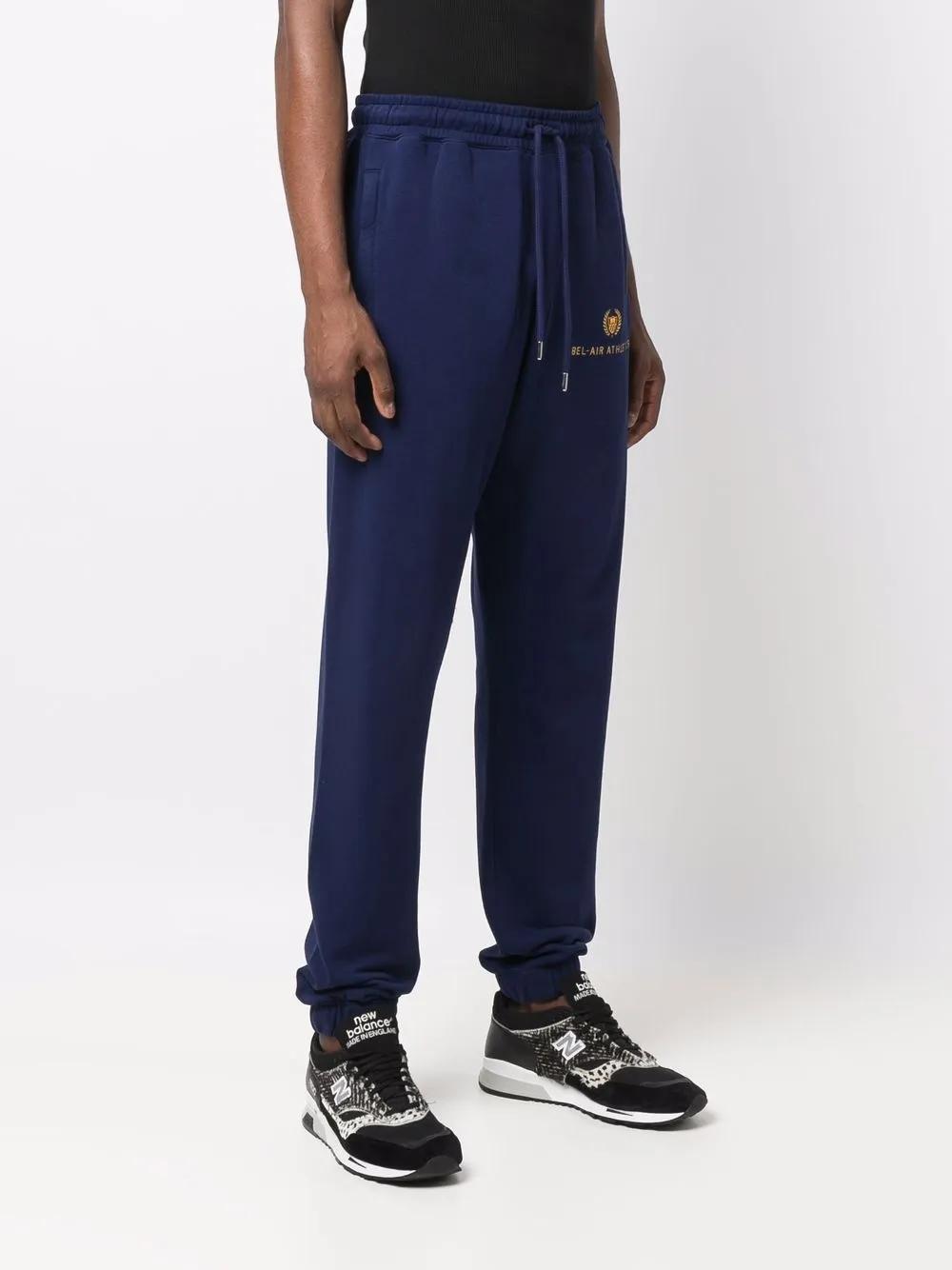 BEL-AIR ATHLETICS Embroidered Logo Crest Trackpants in Blue
