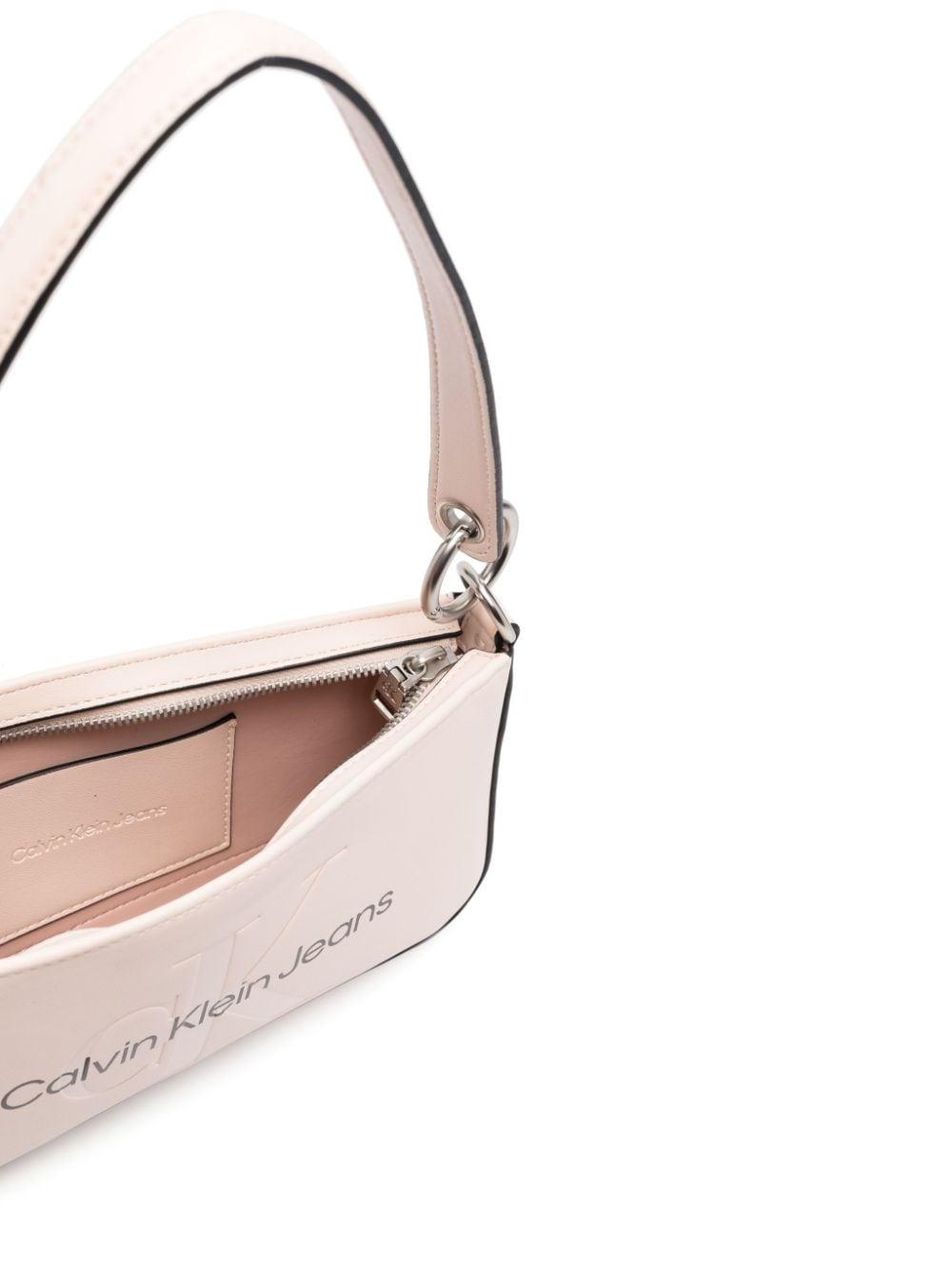 Calvin Klein Embossed-logo Shoulder Bag in Pink | Lyst
