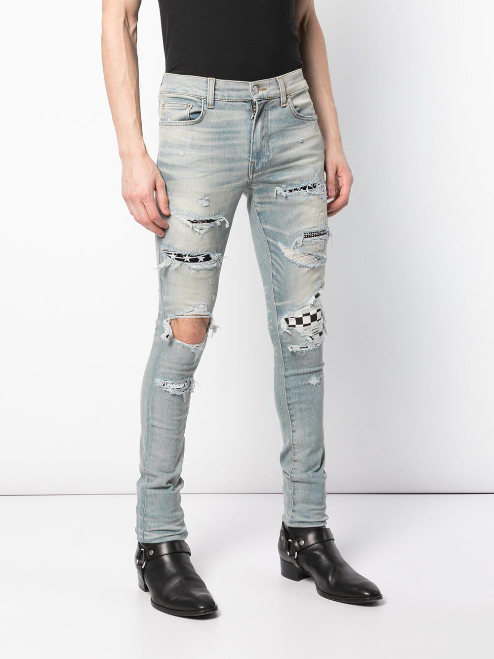 Amiri Denim Art Patch Skinny Jeans in 
