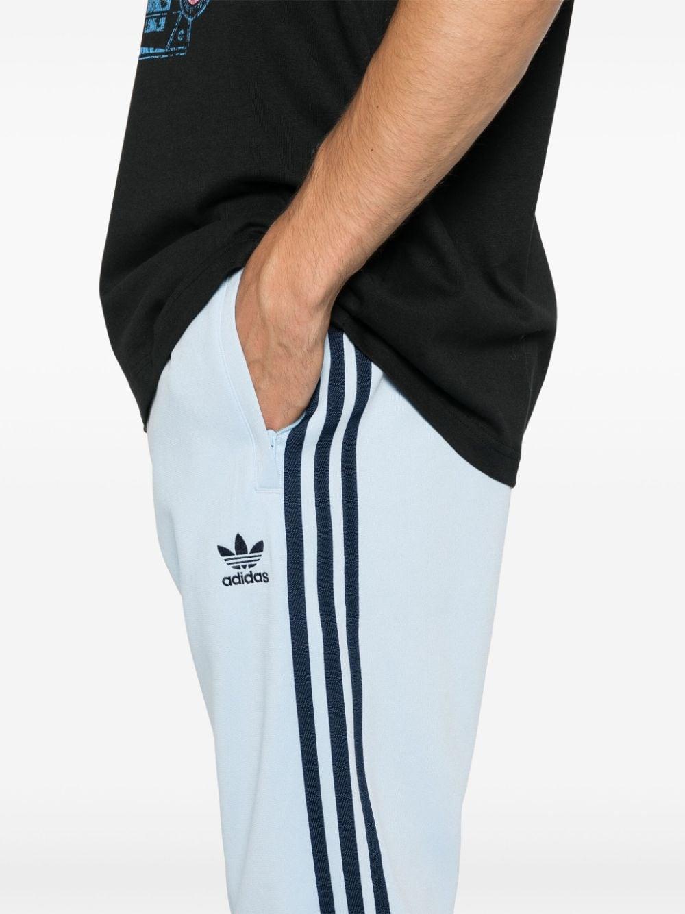 Adidas sst striped pants best sale