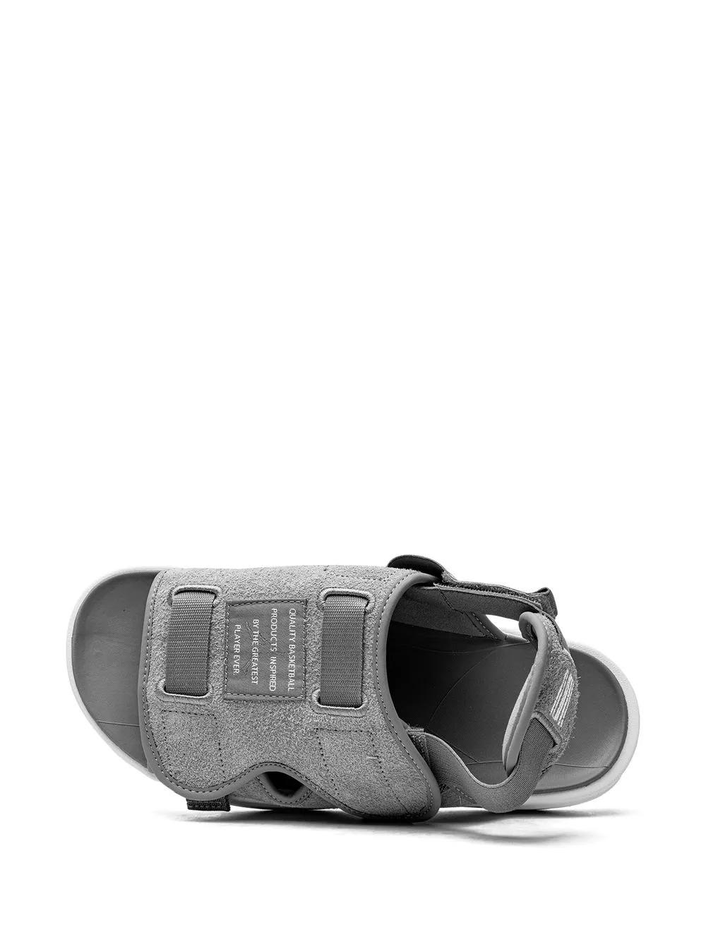 grey nike slides with strap