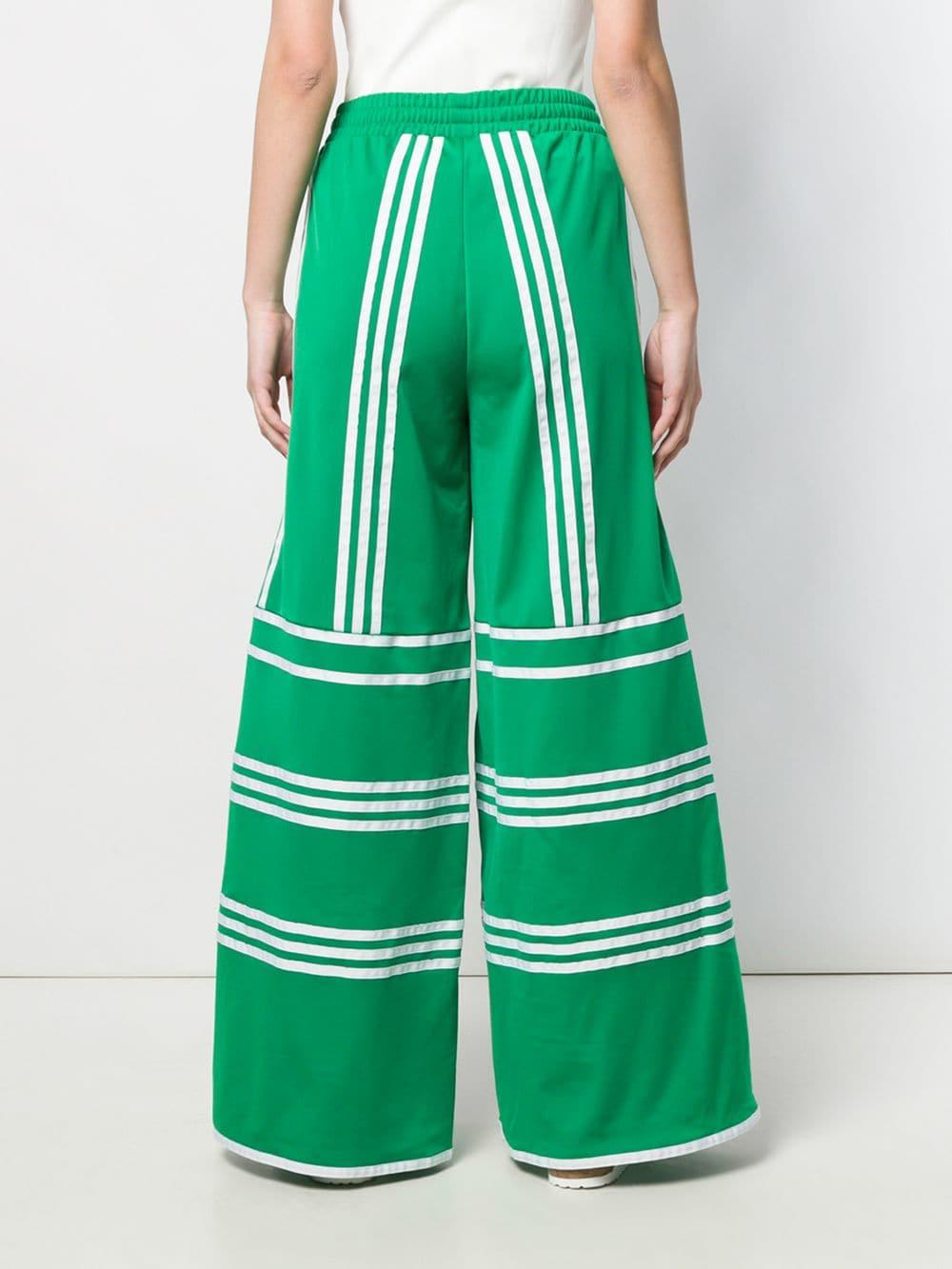 adidas Synthetic Flared Track Pants in Green | Lyst