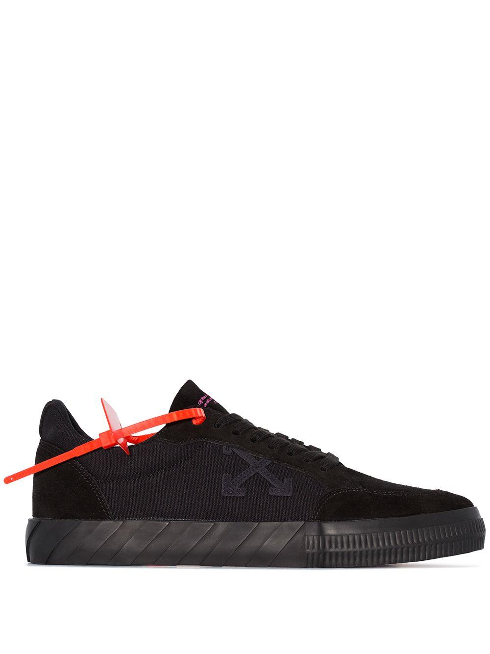 sneakers with arrow logo